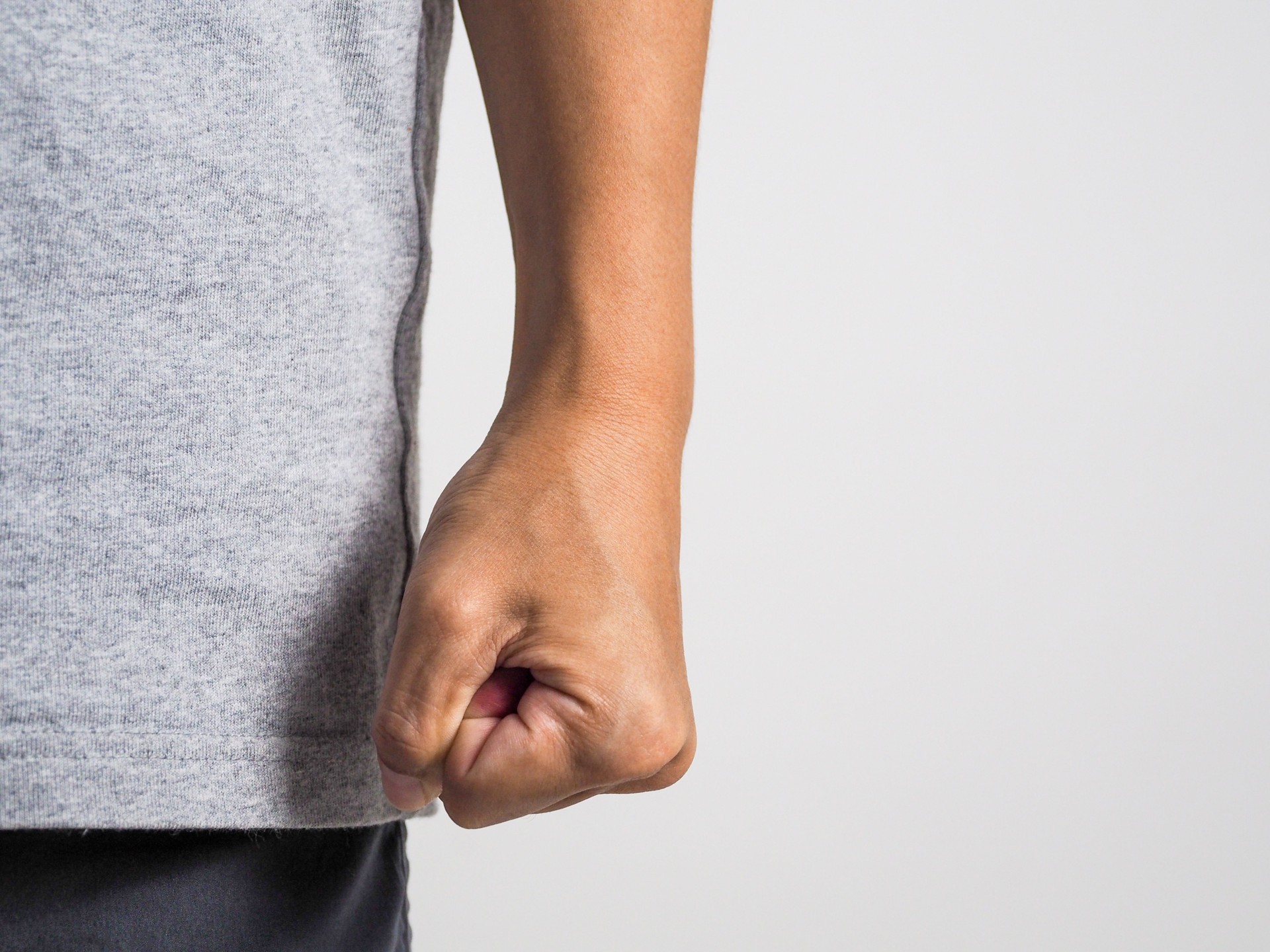 angry man clenched fist